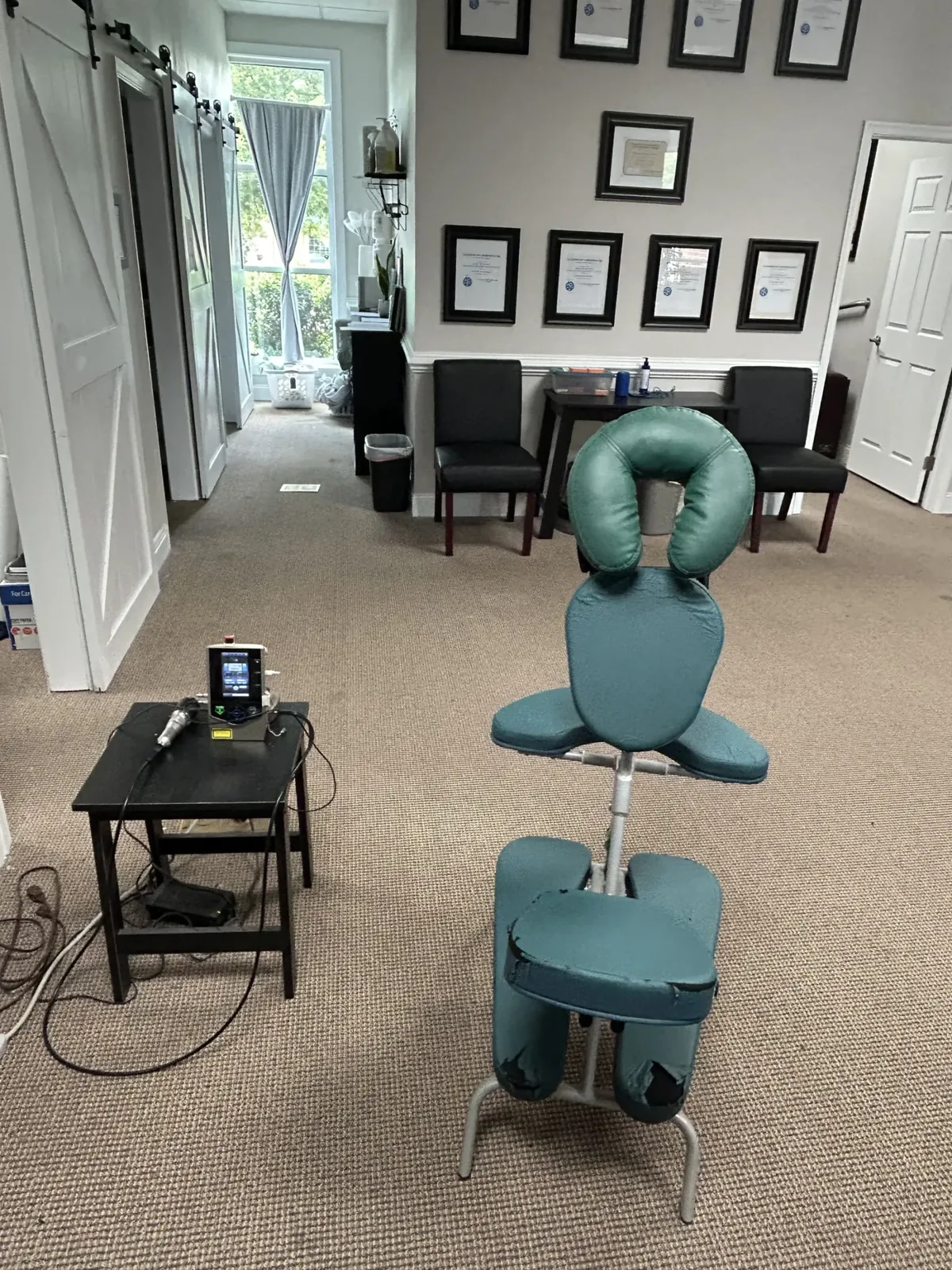Inside Apple Wellness Chiropractic Center in Winchester, VA (reception and massage area)